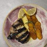 Grilled wood-fired fish, restaurant Chez Marc in Centuri